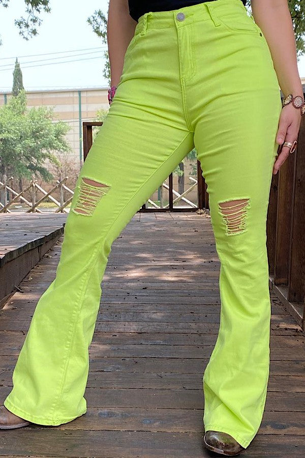 Neon green distressed bell bottoms