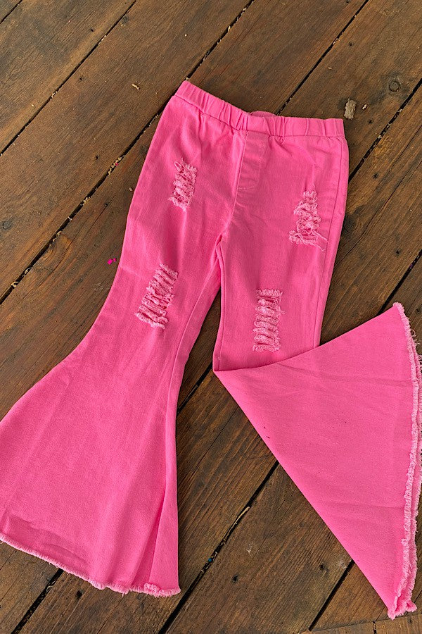 Pink distressed bell bottoms