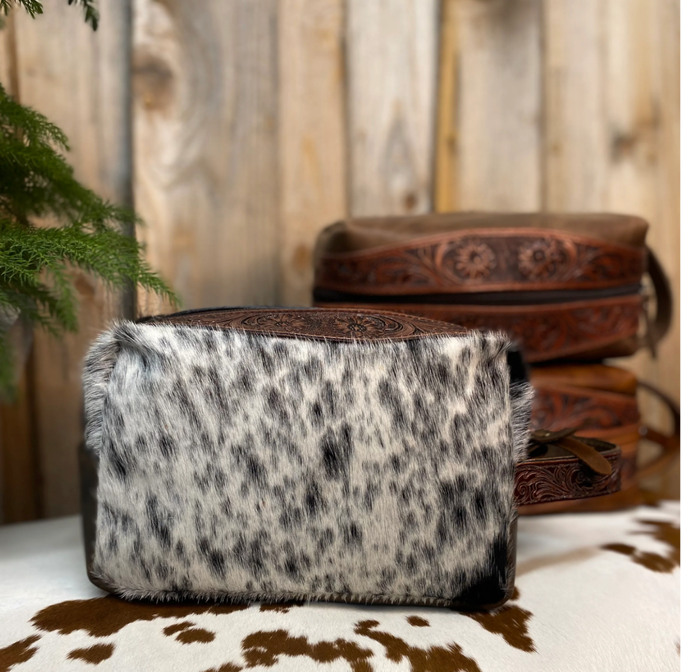 COWHIDE & TOOLED TOILETRY BAG