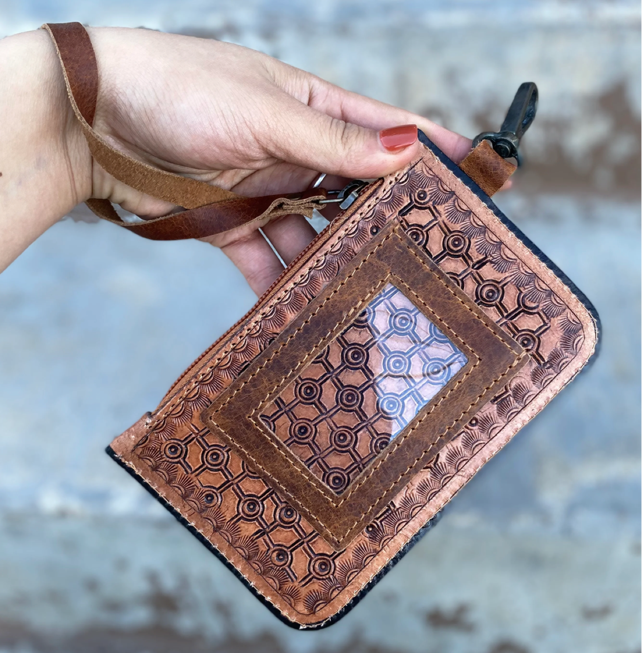 FLOWER TOOLED WRISTLET POUCH