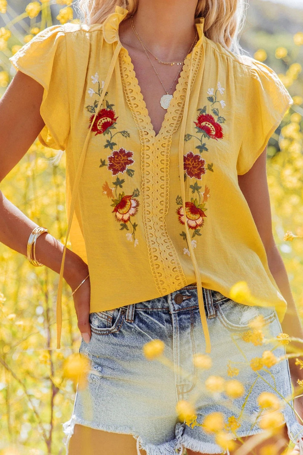 Yellow floral embroidered flutter sleeve top