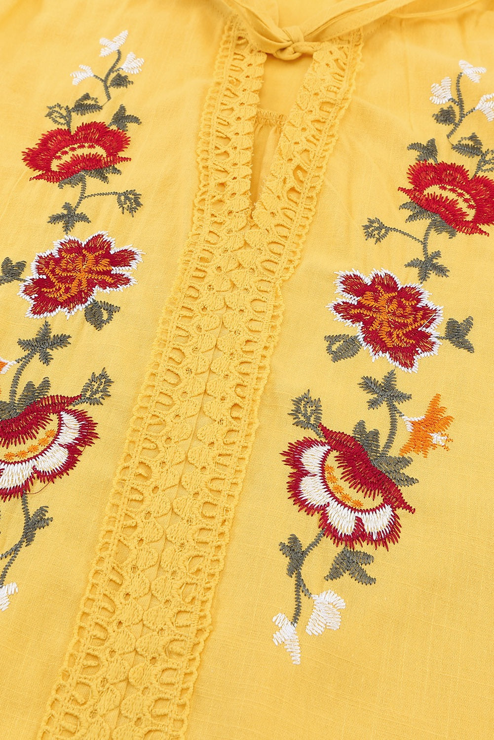 Yellow floral embroidered flutter sleeve top